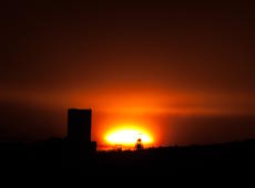 The first stage of the industrial sunset above the Silesian coal mine Bielszowice ( KWK Bielszowice ) in Ruda Śląska. Photo was taken from Katowice, about 15 kilometers away.